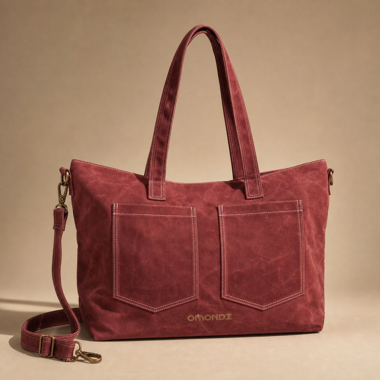 OMONDI washed canvas tote in oxblood red, front studio product view