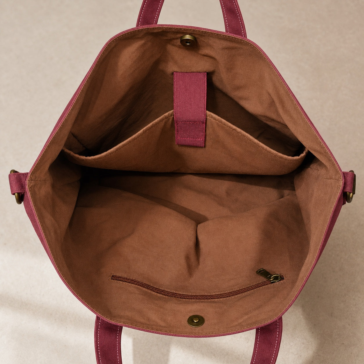 Interior of the OMONDI washed canvas tote with organized compartments